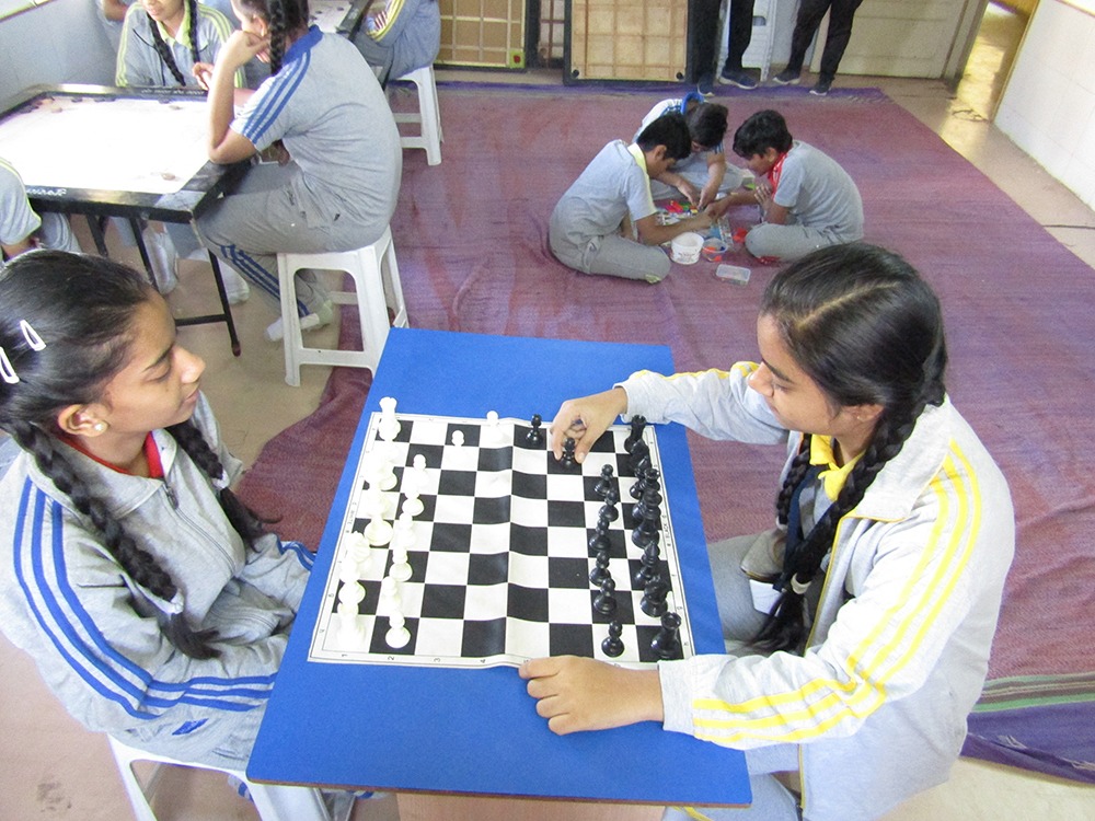 Indoor Games like Ring Toss, Basketing the Ball for preschoolers, Carom, Chess, Table Tennis